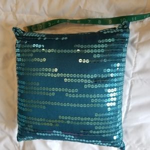 Teal pillow with sequins